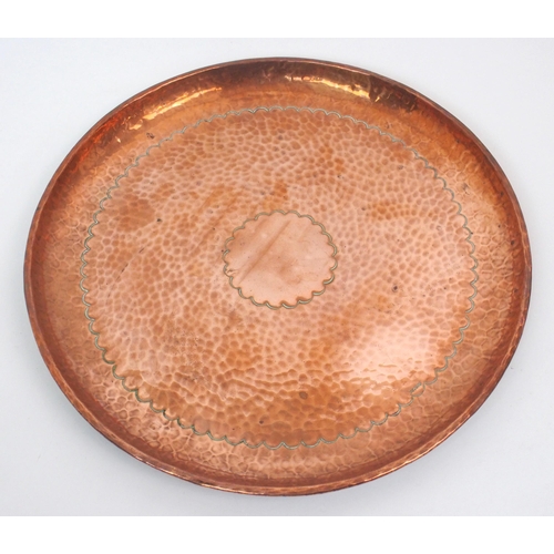 554 - A Newlyn copper circular tray