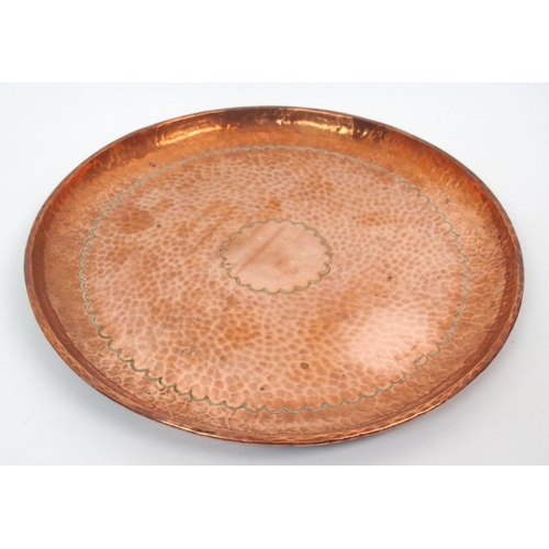 554 - A Newlyn copper circular tray