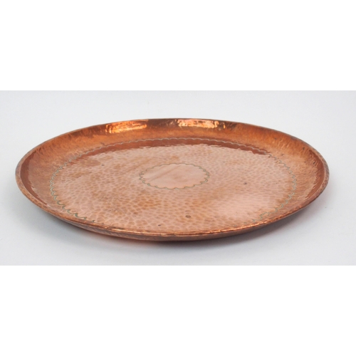 554 - A Newlyn copper circular tray