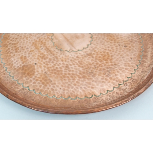 554 - A Newlyn copper circular tray