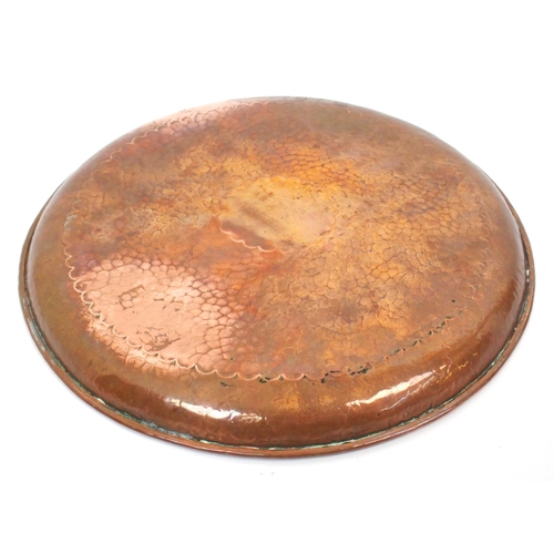 554 - A Newlyn copper circular tray