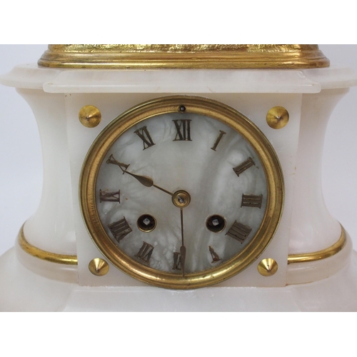 558 - A French alabaster clock