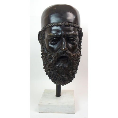 559 - A bronze classical head of a bearded man