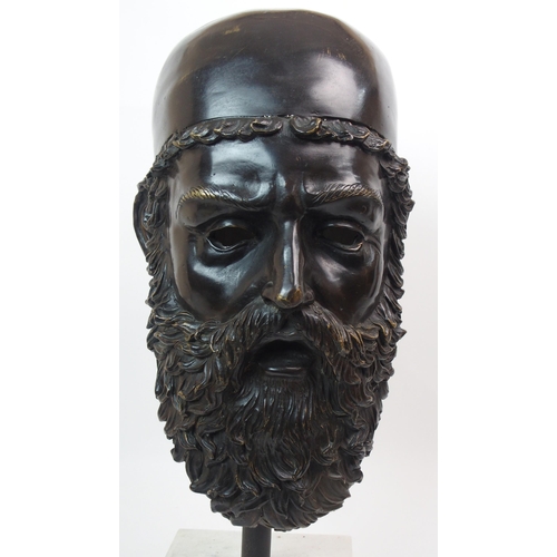 559 - A bronze classical head of a bearded man