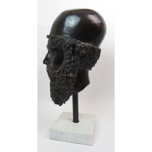 559 - A bronze classical head of a bearded man