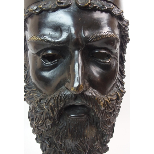 559 - A bronze classical head of a bearded man