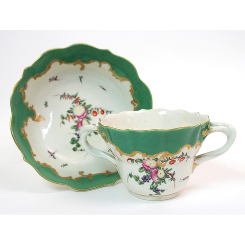 571 - An 18th Century Worcester two-handled chocolate cup and saucer