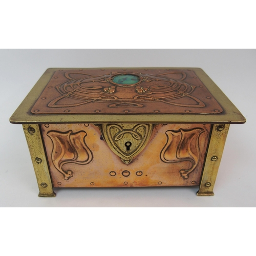 581 - An Art Nouveau copper and brass casket