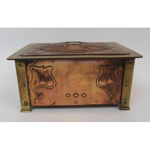 581 - An Art Nouveau copper and brass casket