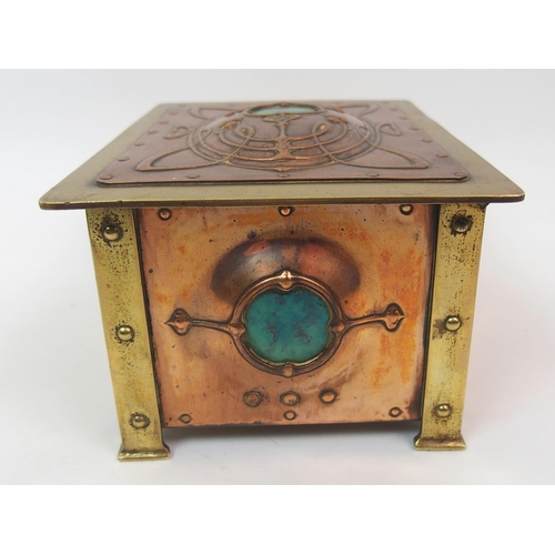 581 - An Art Nouveau copper and brass casket