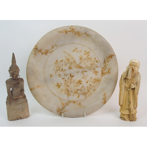 60 - A Chinese ivory figure of a scholar