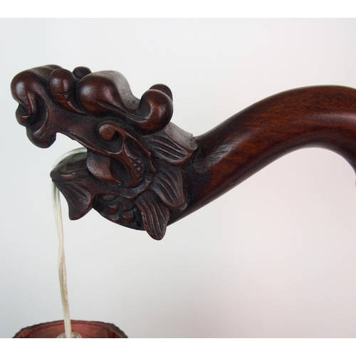 62 - A Chinese hardwood table lamp