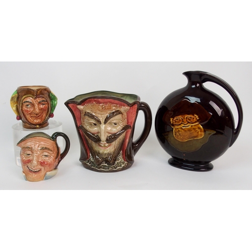 642 - A large Royal Doulton Mephistopheles double faced jug