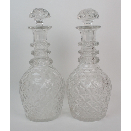 647 - A near pair of oversized Georgian style ring necked decanters