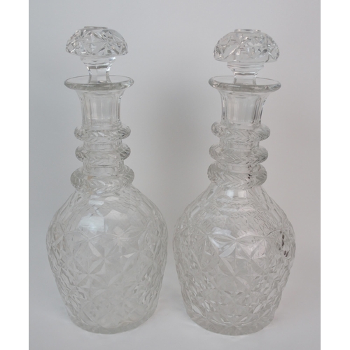 647 - A near pair of oversized Georgian style ring necked decanters