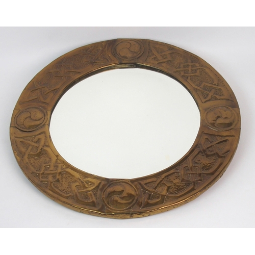 660 - A Glasgow Schools Arts and Crafts brass framed mirror