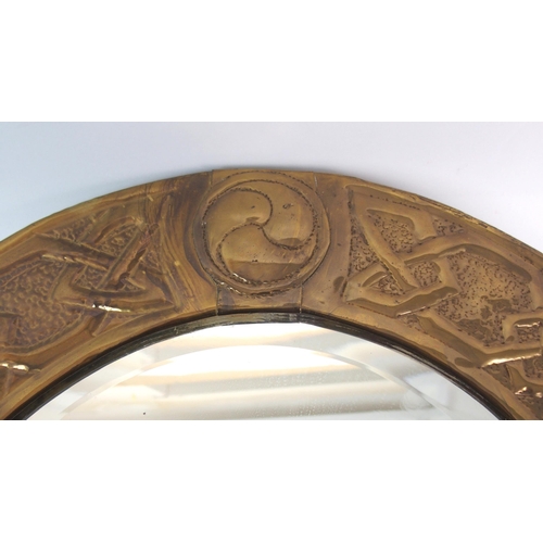 660 - A Glasgow Schools Arts and Crafts brass framed mirror