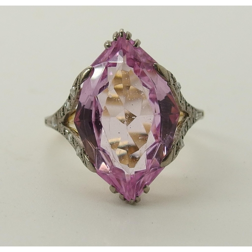 705 - An 18ct gold diamond and pink gem ring