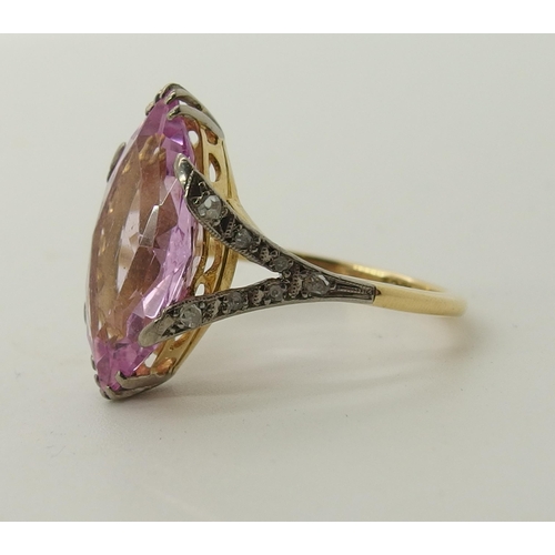 705 - An 18ct gold diamond and pink gem ring