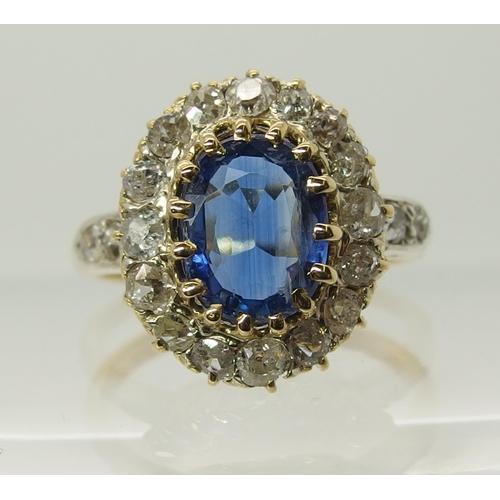 707 - A sapphire and old cut diamond cluster ring