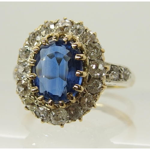 707 - A sapphire and old cut diamond cluster ring