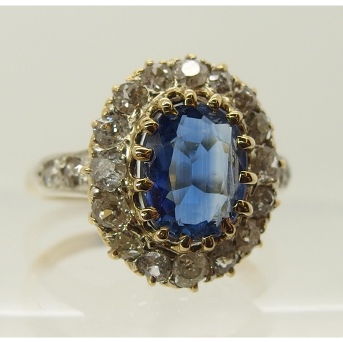 707 - A sapphire and old cut diamond cluster ring