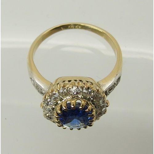 707 - A sapphire and old cut diamond cluster ring