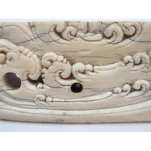 9 - An unusual marine ivory bracket