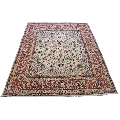 991 - An ivory ground Najaf Abad rug