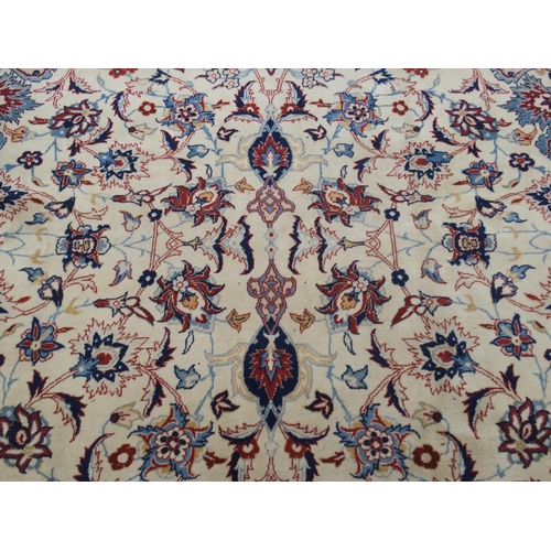 991 - An ivory ground Najaf Abad rug