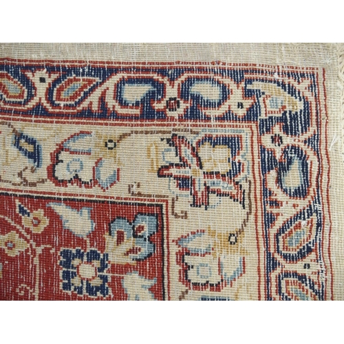 991 - An ivory ground Najaf Abad rug