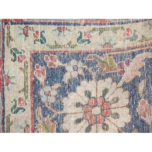 994 - A light blue ground early 20th Century Benlian rug