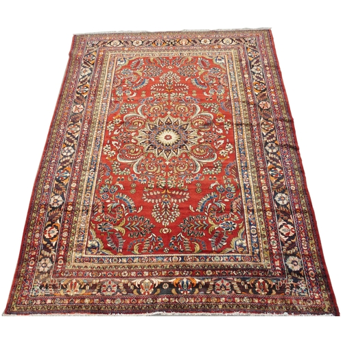 997 - A red ground Lilian rug