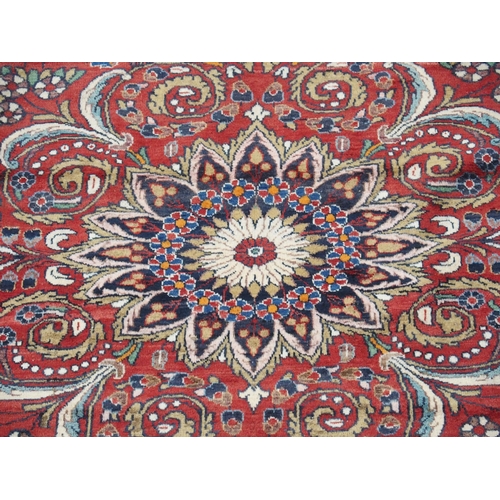 997 - A red ground Lilian rug