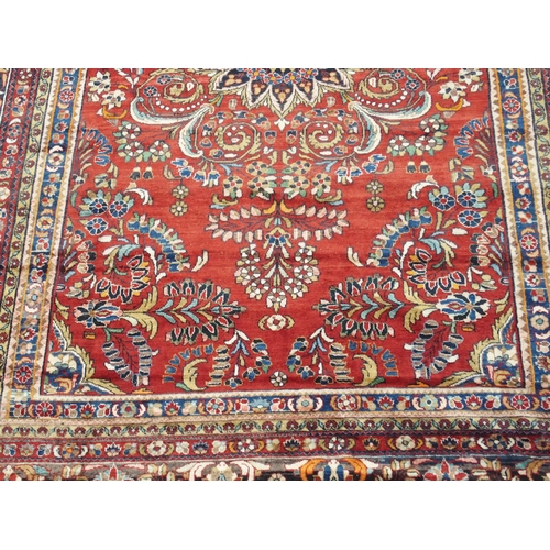 997 - A red ground Lilian rug