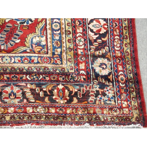 997 - A red ground Lilian rug