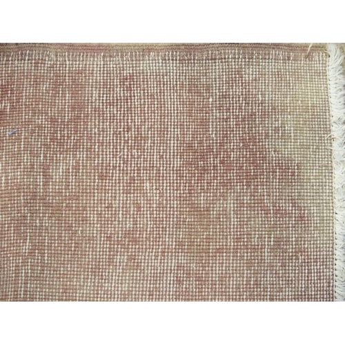 998 - An ivory ground Gabbeh rug