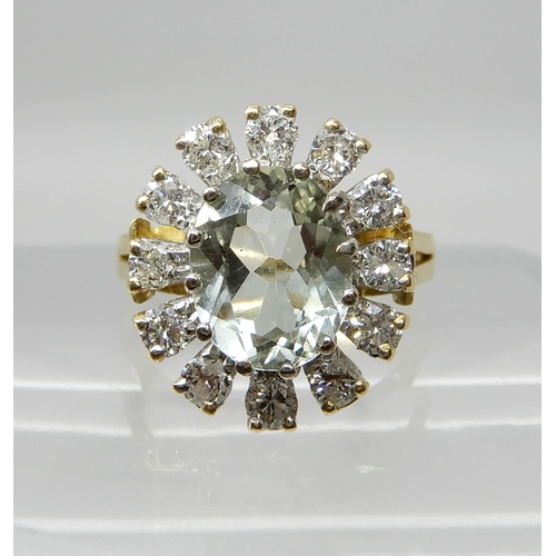 656 - AN 18CT GOLD GREEN AMETHYST AND DIAMOND CLUSTER RING