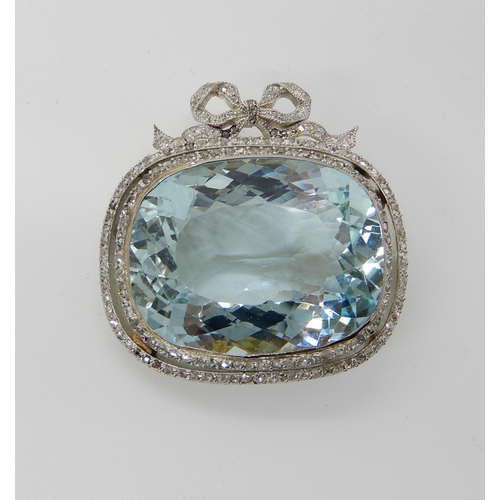 671 - A SUBSTANTIAL AQUAMARINE AND DIAMOND BROOCH