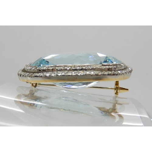 671 - A SUBSTANTIAL AQUAMARINE AND DIAMOND BROOCH