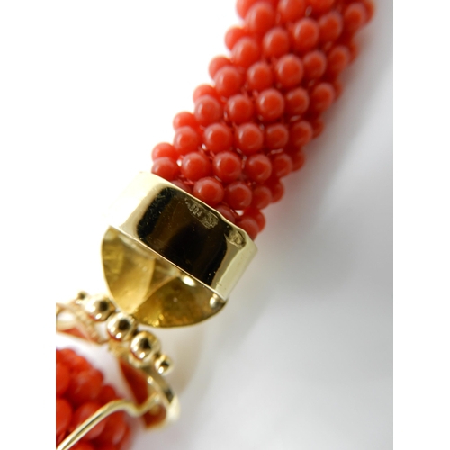 674 - AN 18CT GOLD CORAL NECKLACE AND EARRINGS