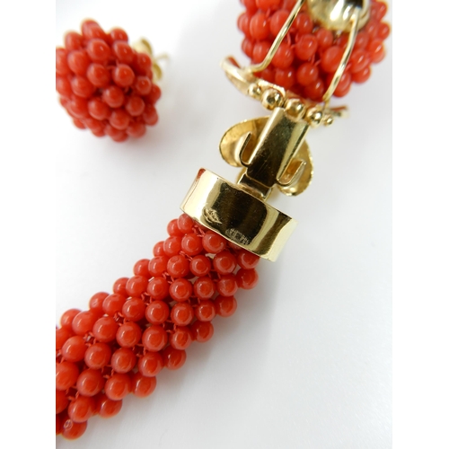 674 - AN 18CT GOLD CORAL NECKLACE AND EARRINGS