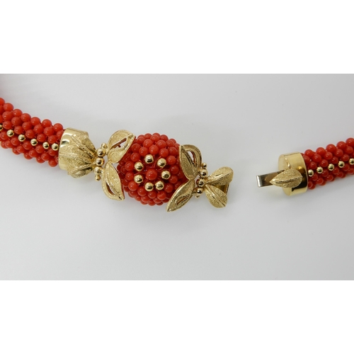 674 - AN 18CT GOLD CORAL NECKLACE AND EARRINGS