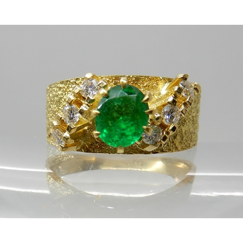 678 - AN 18CT RETRO EMERALD AND DIAMOND RING