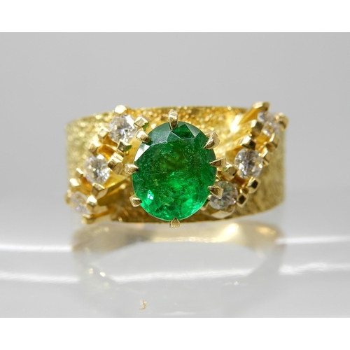 678 - AN 18CT RETRO EMERALD AND DIAMOND RING