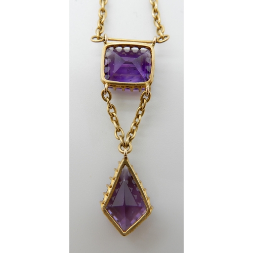 695 - A 15CT GOLD AMETHYST DROP PENDANT