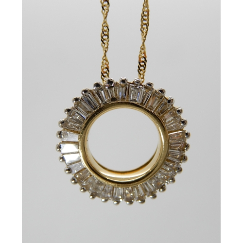 697 - A 9CT GOLD ILIANA DIAMOND RONDEL PENDANT