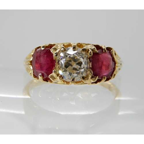 701 - AN 18CT GOLD RUBY AND DIAMOND RING