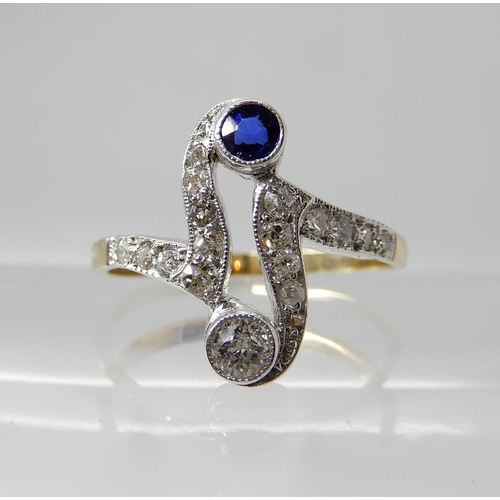 702 - A VINTAGE DIAMOND RING