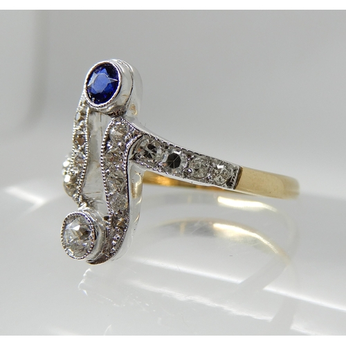 702 - A VINTAGE DIAMOND RING